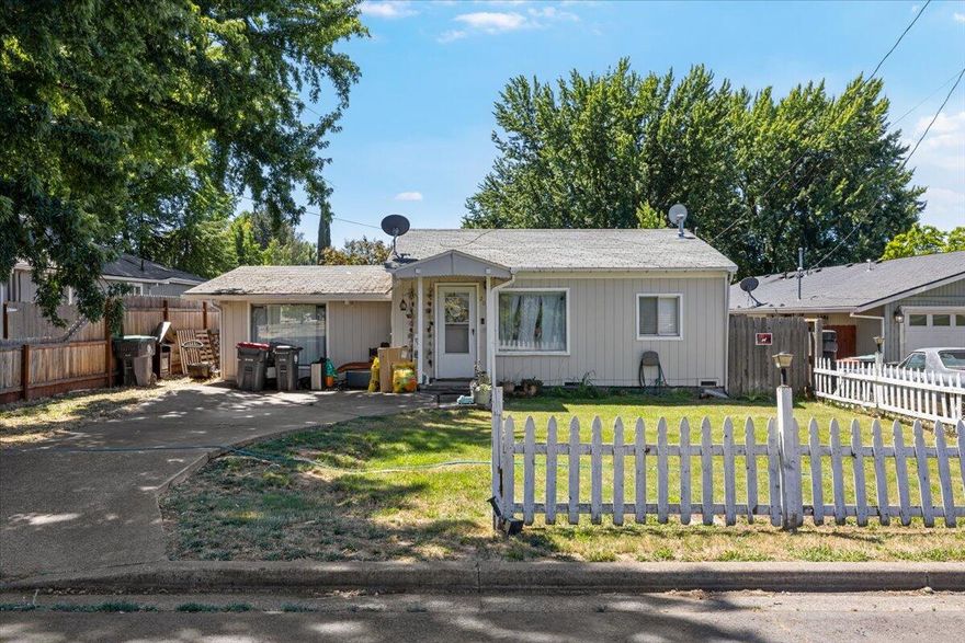 Cute East Medford Fixer. This 3 bed 2 bath home sits on a .16AC lot with a massive backyard. Inside you will find a split floor plan with new carpet installed in part of the house.