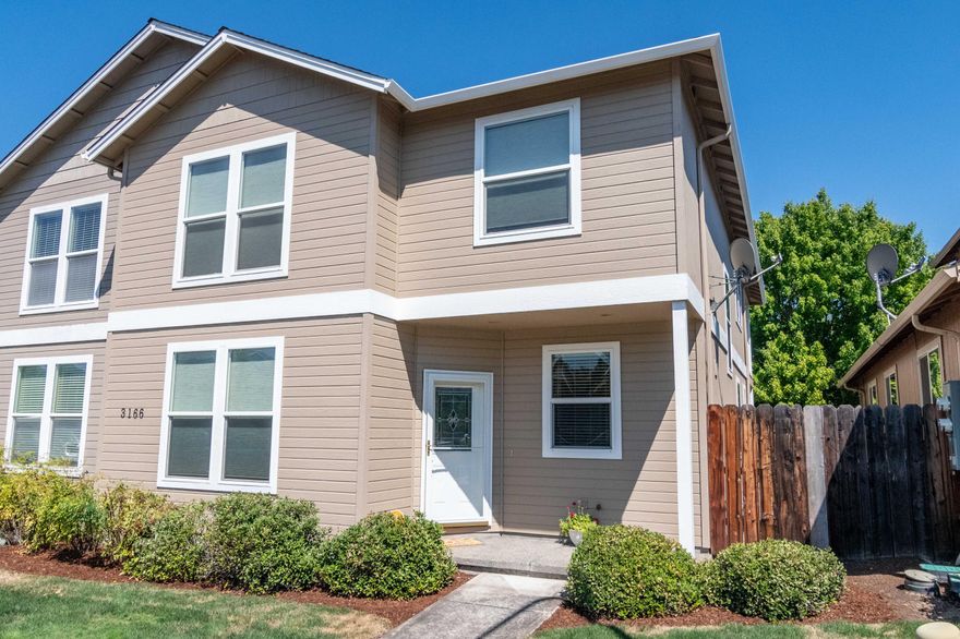 Very well maintained town home home located in Mountain Gate Village. New carpet, new interior and recent exterior paint, refinished hardwood, freshly landscaped back yard and all new screens throughout. The open floor plan and cathedral ceilings create a very spacious feeling. An open loft area at the top of the stairs leads to the large master suite and second guest bedroom. The master suite has a huge walk-in closet with a laundry chute and there's a balcony over looking the back yard. The master suite bath has a soaking tub, separate shower and double vanity. The downstairs bedroom is larger than most and the laundry room includes the washer and dryer and has a utility sink. The finished 2 car garage has convenient alley access and there is additional guest parking across the street. The HOA dues include common area and front landscape maintenance. Located close to schools, shopping, medical and restaurants.