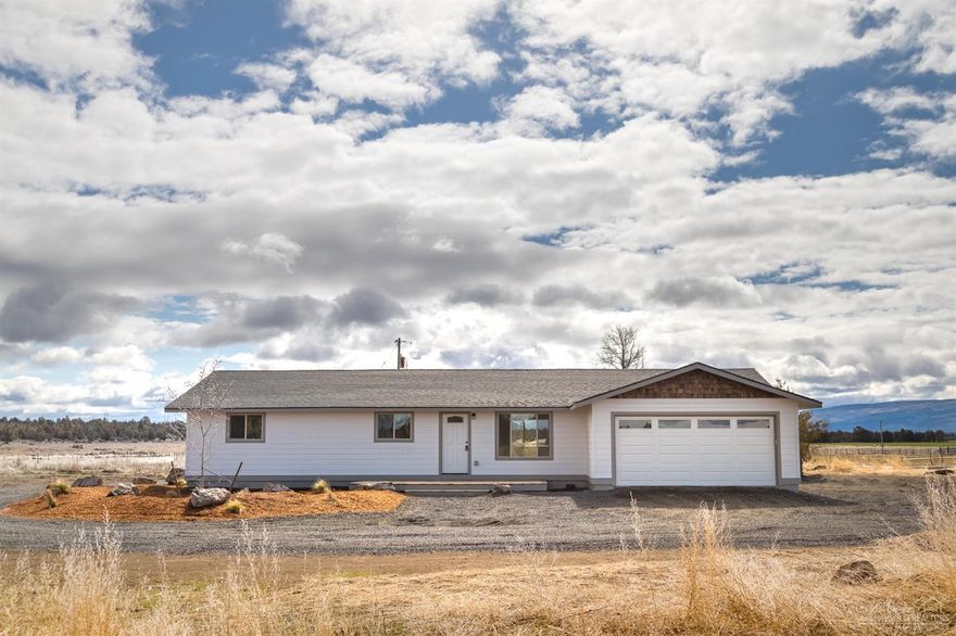 Single level Ranch style home in Alfalfa. Completely remodeled with all new windows, doors, electrical, plumbing, floors, granite countertops, tile shower, drywall, insulation, paint, trim, Roof, and HVAC system. New 800 ft Well and septic tank. The home sits on a secluded 20 acres, surrounded by beautiful cascade mountain views from Mt. Jefferson all the way to Mt. Bachelor, next to BLM with 16 acres of irrigation.
