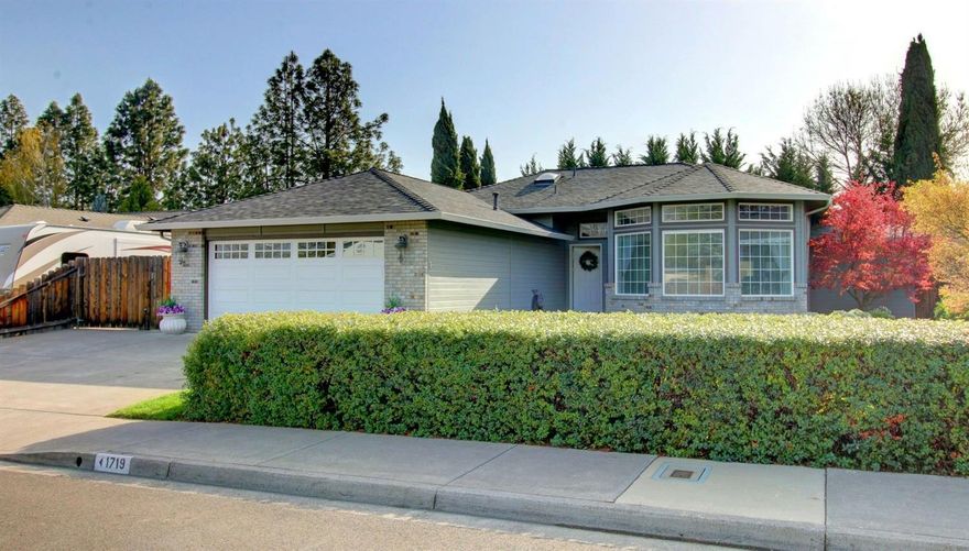 This Home is Absolutely MINT! What an amazing, well cared-for home located in a quiet & peaceful neighborhood in SW Medford. Beautiful, large front & back yards w/timed sprinklers, mature landscaping & plenty of space to enjoy gardening. Gorgeous tile entry, huge 10 foot ceilings in living room w/large bay windows. Shows elegance of the details throughout. Custom wood trim treatments throughout the home, brushed nickel hardware & lighting, enormous kitchen flows nicely w/extra cabinets, plenty of counter space & storage, newer stainless-steel appliances, large laundry room & more. Kitchen opens to the dining room which has a slider to the beautiful back yard. Shows immaculately inside & out. Key features include: newer furnace, newer AC Unit, newer water heater, 6-year old roof, extra wide driveway w/extra concreted side parking for a trailer/boat. Skylights, hot-tub hook-up, 2-car garage w/shelving, coffered ceilings, must tour. You won't be disappointed in this home!