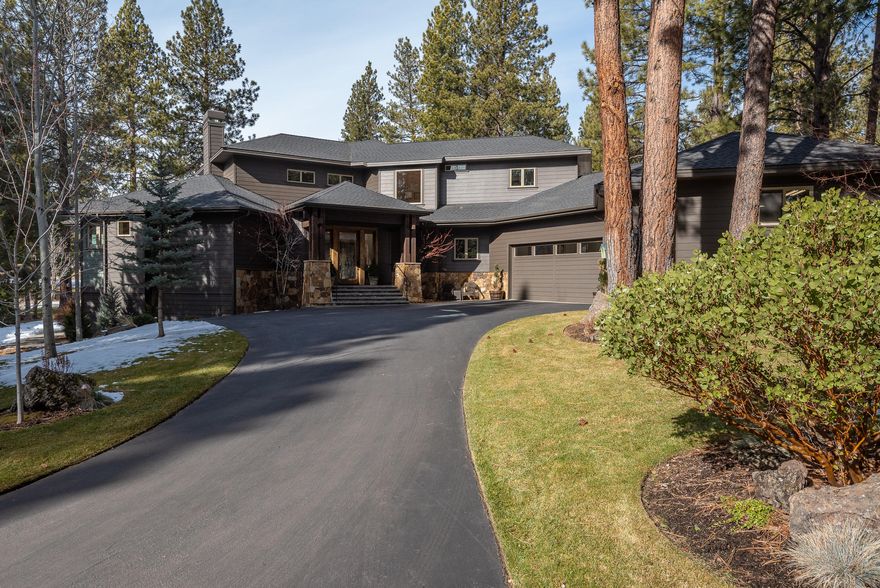 Gorgeous, custom home on a manicured 1/2 acre across from the 7th fairway and lake at Widgi Creek Golf Club. Skip sawn Hickory hardwoods welcome you into the great room with vaulted ceilings and a beautiful fireplace. Perfect for entertaining, a wet bar that even the most discerning bartender would love. The incredible chef's kitchen is the heart of this amazing home. Abundant natural light, floor to ceiling windows invite the outdoors in. Beautiful cabinetry, a large granite island to gather around. Media room with black out shades and 120'' retractable movie screen with surround sound. Main floor master is a private oasis and great place to escape to. Working from home is a treat, den and custom built ins. Upstairs is an open loft area and 2 Jr suites. Mud room, 4 car garage plus abundant house storage for easy access to all of your outdoor equipment. Just minutes to Mt Bachelor for skiing, golf at your doorstep along with mountain biking and river activities, 10 minutes to downtown.