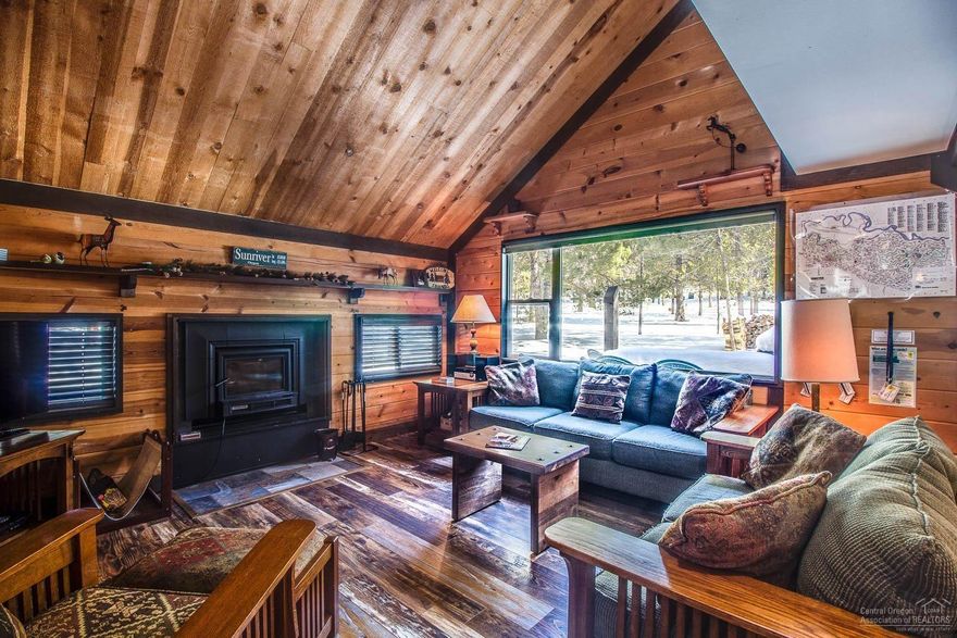 Enjoy your home away from home in this adorable Polehouse! Located among the tall Ponderosa Pines with close proximity to the Sunriver Mall, SHARC, and the Meadows GC. Multiple level, 3 Bedroom, 2 bath, plus 2 loft sleeping areas has a cabin feel with updated laminate wood flooring, wood ceilings, wood stove, skylights, and two privately located bedrooms on the main floor that have access to the hot tub! The large private deck is perfect for entertaining and overlooks the expansive common area! Furnished.