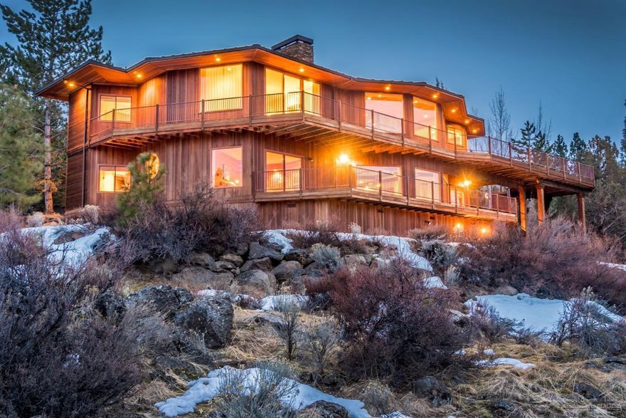 Majestic location, feels like you are alone on top of a mountain, with views of forest & Cascade Peaks on 1.34+/-Acres. Close to town but feels like a million miles away. For those who have a deep appreciation for natural building materials this cedar sided home with redwood decks, copper roof & interior of cedar, redwood, cherry, oak & copper accents is cozy even at 6,023 sq./ft/+/-Flat heated driveway. Turn key, furniture included. This is a smart investment.