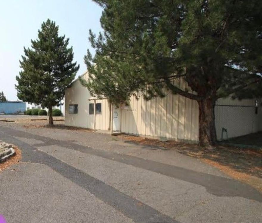 7396 square foot open warehouse on 1.16 acres offers fully fenced area, industrial light zoning, and full access to new parkway going in. Great location on Nels Anderson Road.