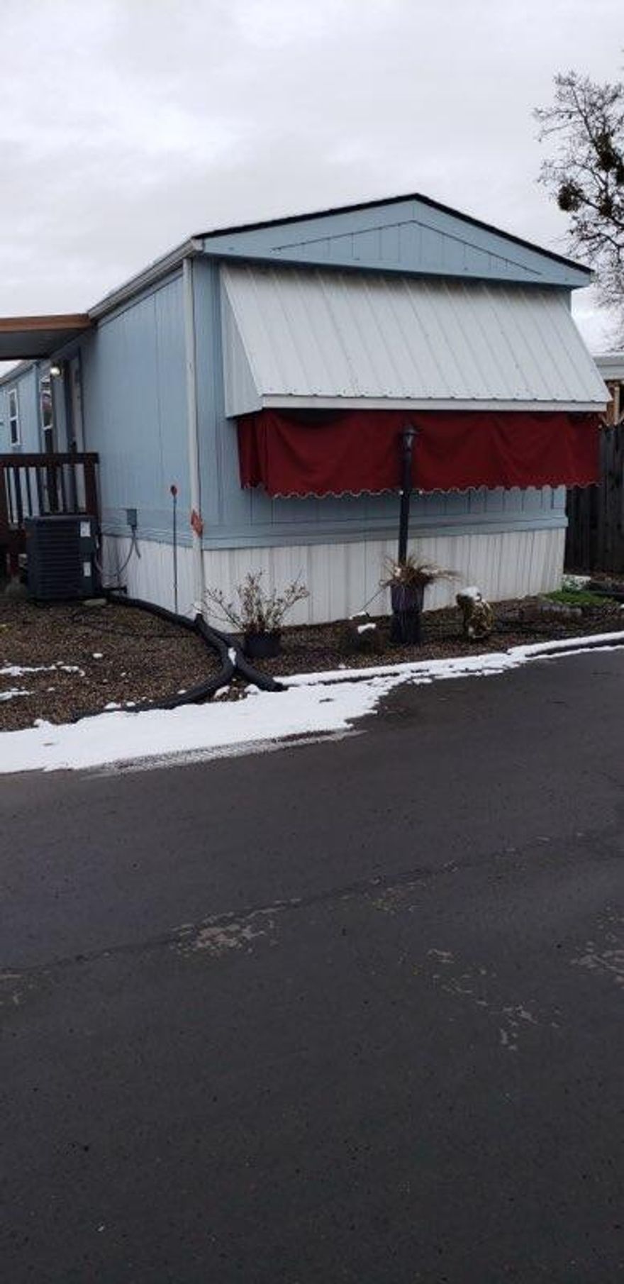 Nice single wide MH in a quiet park. This home is move in ready with fresh paint inside and easy to maintain yard. There is a detached single carport and large storage shed.