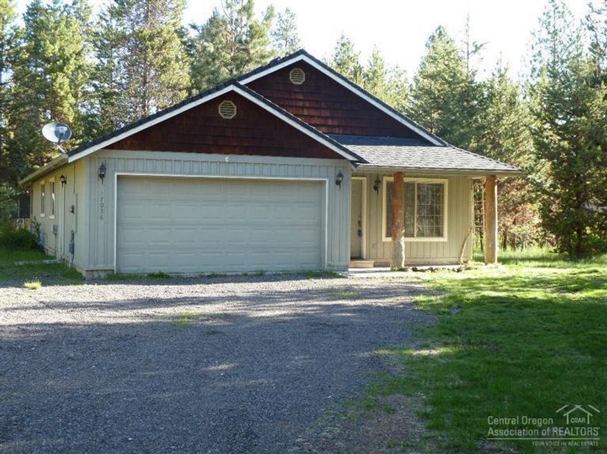 Very cute 3 bedroom 2 bath with double attached garage. New interior paint and freshly shampooed carpet! Boat ramp, park, and clubhouse just down the road! Lovely treed .5 acre lot and mostly fenced.