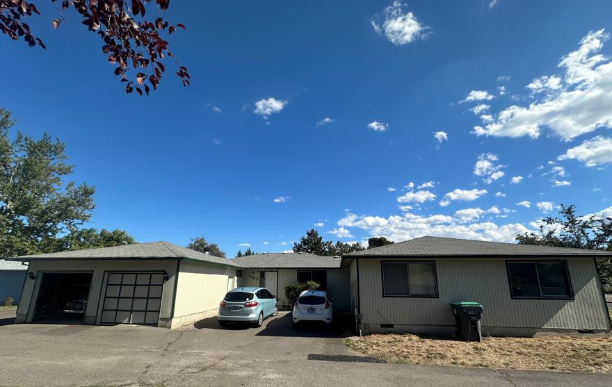 Great investment opportunity with side-by-side units at 1167 and 1169 Skeeters in a desirable East Medford location. Each unit offers a similar floor plan with two bedrooms, one bath, a cozy living room with fireplace, and an inside laundry area. Kitchens are well laid out with good cabinet space, appliances, and vinyl or plank flooring. Both units feature private-fenced backyards with patios, perfect for outdoor living. Each has an attached one-car garage, forced heating and air systems, and plenty of natural light. Conveniently located with easy access to town, these units offer excellent rental potential or the option to live in one side and rent the other. A solid duplex in a sought-after area with comfortable layouts and inviting outdoor spaces.