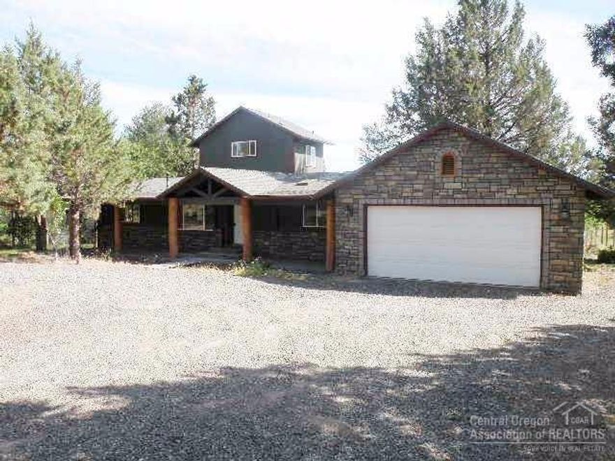 Nicely updated manufactured home on 1 acre in Crooked River Ranch. Interior & exterior updates make it look like a stick-built home! Features 4 bedrooms (including master on main & upstairs master addition), 3 bathrooms, living room, and dining area. Fenced with a back deck, attached 2 car garage and upgraded exterior finishes. Ready for you to move in and enjoy all of the amenities the Ranch has to offer, including golf, pools, tennis and much more! This is a Fannie Mae Homepath property.