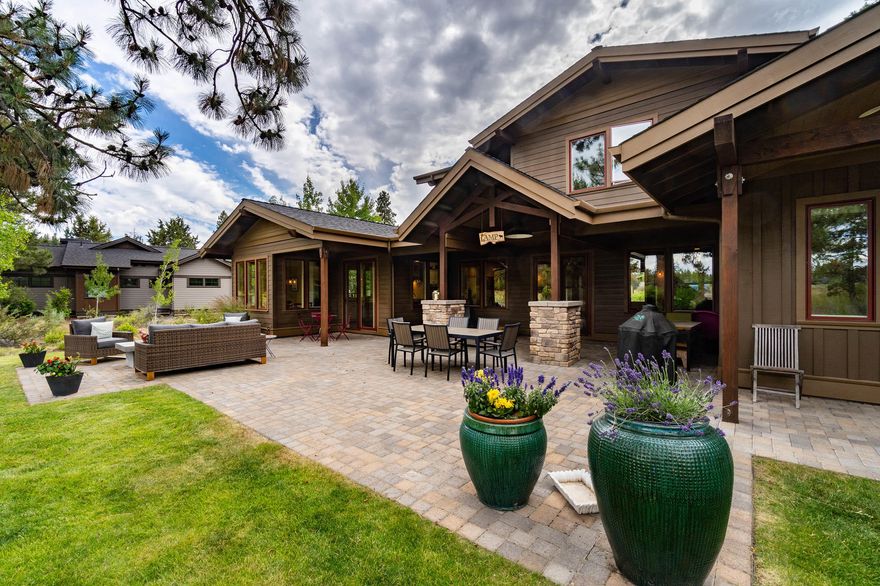 Enjoy resort living at its finest in this beautiful Northwest-style, Earth Advantage home by Greg Welch Construction, backed by the 12th hole of the famed Tetherow Golf Course. This home features wide-plank white oak floors & hickory accents throughout. Great room includes a gas FP and offers golf course views. Aspiring chefs will love the large kitchen island, quartz countertops, & GE Monogram appliances. The breakfast nook features banquette seating. Behind the home, a large patio with firepit provides space for entertaining. The primary bedroom offers great separation and includes vaulted ceilings with vertical green fir inlay and pvt patio access. The primary bathroom boasts heated floors, double vanity, soaking tub, & w/i double shower. A bonus area, guest bath, & 2 guest bedrooms are upstairs. Home also features an office w/ custom built-ins, a mudroom, and a 3-car garage. As a resident of Tetherow, you'll enjoy access to golf, trails, fitness center, and dining.