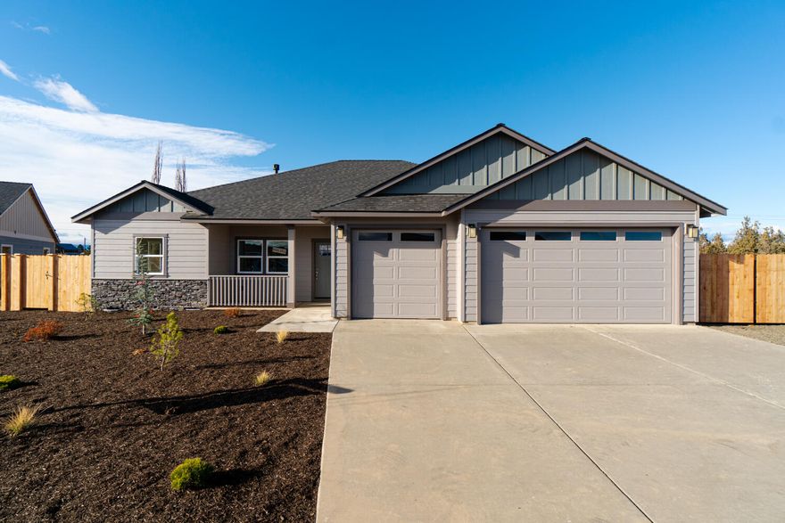 Affordable luxury built by Dunlap Fine Homes on the Bend side of Redmond w/Cascade Mtn Views. Spacious living both inside & out, w/plenty of room for entertaining. Vaulted Great Room plan w/open Kitchen, tons of cabinetry & prep space on the slab Quartz counters. Neat & tidy full height tiled back splash, SS appliances & farm sink. Living space offers a cozy Gas burning fireplace w/stylish accents & room for gathering. Desirable Master separation, walk in his & hers closet, soaking corner tub, step in shower, tiled floors & dual vanities. 2 additional guest rooms w/full bath plus a den or office off the entryway. Laundry room w/storage & folding table too! Durable wood look laminate flooring, carpet in the bedrooms & tiled baths. Gas forced air, A/C & back patio. Triple car garage, fully fenced, fully landscaped w/auto sprinklers.