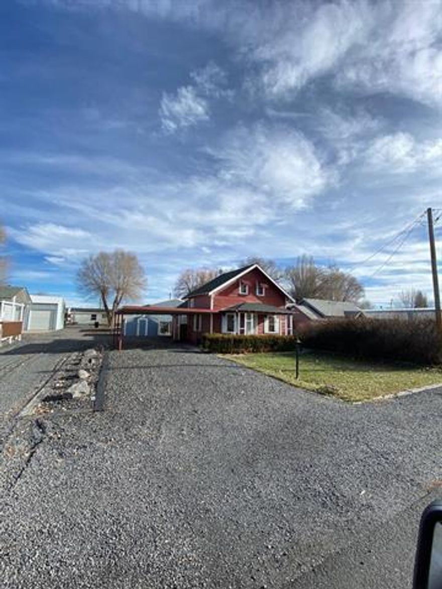 For Sale in Tulelake, CA. 1/1 with a large shop. The former home and shop of well-known local guide Dick Marcillac. Here's a nice little 2 story home on a city lot ready for new owners. First floor has a roomy kitchen/dining area, 1 bedroom, 1 bathroom and utility room. Upstairs are 2 small flex spaces or storage areas. Shop is 37'X24' and has concrete floors and 2 - 10' roll up doors plus many shelves for storage. 1 car- carport and enough space for RV parking or an extra vehicle. There is also handy alley access. The roof was replaced within the last 10 years, but the home itself could use some TLC. Lot is partially fenced and has a small shed & large dog kennel area.