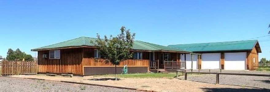 Western Ranch style living in a 2052 square foot, single level home with Three Sisters mountain Views on 2 acres of irrigated property. It is ideally located and very convenient to shopping etc., between Bend and Redmond.  The home boasts knotty pine accents throughout and has a spacious 22'x23' living room for entertaining guests. The Country kitchen has tile counter tops and floors, with an Island for bar seating and a large panty .  All kitchen Stainless Steel appliances are included.  The 4 bedroom and 2.5 baths with a large primary room and walk in closet.  A detached man-cave is next to the home.  The property also has a 36x48' shop with 3 roll up doors.  And it a separate 36x40' old fashion design barn with 3 horse stalls, a tack room & a hay/storage loft. Photos coming soon