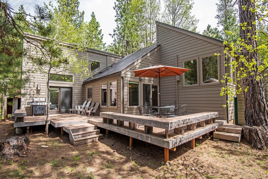 Tucked in the trees, this newly remodeled home is turnkey and ready for you. Recent upgrades include: windows, laminate flooring and carpet, complete kitchen remodel, including all new cabinets, granite countertops and appliances. Vaulted living/family room with wood burning fireplace. Two primary bedrooms both with vaulted ceilings. Third guest bedroom provides ample sleeping for guest and family. Located at the front of the Ranch with easy access to Robert's Pub, Lakeside Bistro and the New Lodge. Back deck provides a great space for entertaining and BBQ's or simply relaxing.