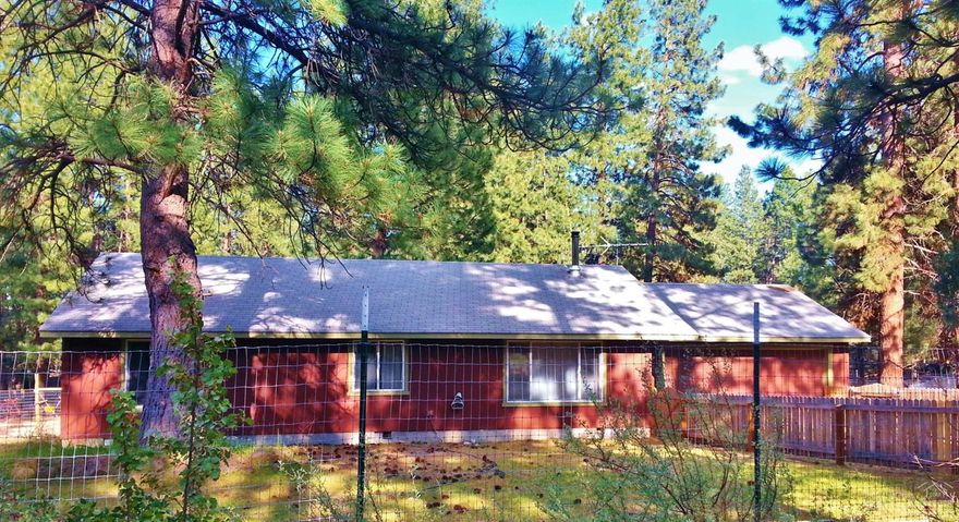 Quiet country setting close to Bend. Home features numerous upgrades in 2012 including new interior/exterior paint, wood finish work & trim, new fixtures, new hardwood floors throughout, new carpet and tile, tile shower/bath & counter tops, new dishwasher & cadet heaters, new deck with roof & railing. Wood stove is certified. Fully fenced including driveway, wood fencing is new. Insulated garage, gate into north entrance, new roof on greenhouse, metal shed and debris to be removed.