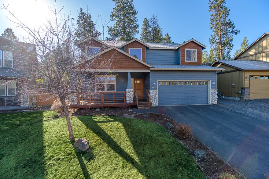 Nestled against a lava outcropping adorned w/mature pines & manzanita, minutes from downtown Bend & a quick jaunt to Bachelor. Inviting covered front porch entry opens into the 1st of 2 living spaces. Expansive bamboo flooring throughout the main floor w/updates throughout. Kitchen recently updated w/all new white cabinetry, Quartz counters & tile backsplash. Soft close drawers & hinges, full white appliance package including washer & dryer in the adjacent laundry room. Kitchen, dining & 2nd living space w/corner gas fireplace for a cozy feel. Dining opens to a concrete patio & lawn area, complete w/hot tub wiring. Upstairs you'll find 4 well spaced bedrooms including a primary Suite that's large enough for a full lounge area! Peek a boo views of Bachelor, new cabinets, Quartz counters & walk in closet. Additional 3 bedrooms share a full bathroom conveniently located between them. Forced air heat, A/C, double car garage & plenty of storage. Don't miss!!