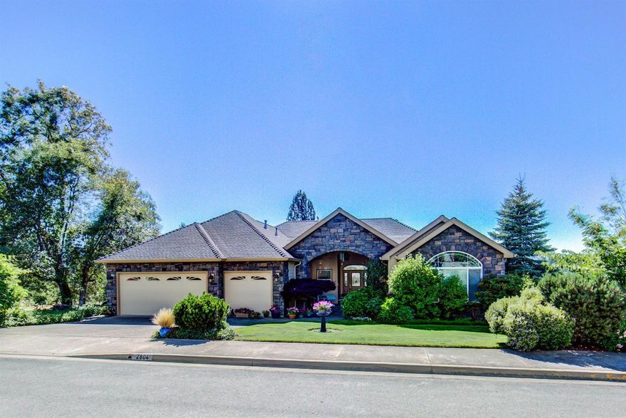 Located in the heart of the desirable Williams Crossing subdivision, this stunning, meticulously maintained, spacious home is reminiscent of a peaceful and serene cottage, although it's much more! You'll be charmed by the covered front porch entry! The beautifully appointed living room (w/built-ins and a heart-pounding gas fireplace with custom surround & mantle) flows into the dining room and kitchen areas. Granite, custom cabinetry, upscale stainless steel appliances (including a gas range), abundant counter space and more! 3 spacious bedrooms, 2.5 baths, and a den are all part of this exceptional home! Enjoy spectacular sunsets from the deck that has a mechanical awning for those hot summer days! Fruit trees, specimen shrubs, and well appointed landscaping complete the picture! You'll love this neighborhood!