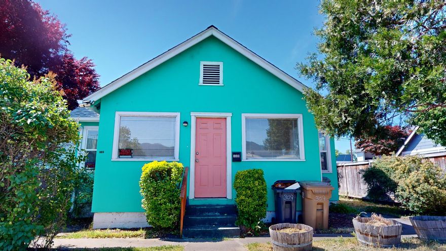 Two Homes on 1 lot in downtown Grants Pass!! Live in One and rent out the other, or possibly live in one and have small business in the other. Property is zoned General Commercial, check with the city for possible uses and zoning regulations for desired use. Front unit is 728 sq ft, 2 bedroom, 1 bath, with additional finished square footage upstairs, and an unfinished basement below, that is approximately 728 sq ft. Carpet is in great shape, and a mini split provides the heating cooling. The rear unit is approximately 686 sq ft, and is also a 2 bedroom 1 bath home. Some updates have been done, and both units are on separate power meters. Information deemed reliable, and should be verified by buyer and intended uses.