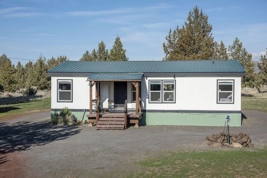 Discover the perfect Central Oregon retreat in Crooked River Ranch! This charming 3-bed, 2-bath home sits on 2.37 acres, offering plenty of space and access to all the Ranch amenities. Thoughtfully updated and meticulously maintained, it features a durable metal roof, A/C for year-round comfort, and a spacious shed for storage. The inviting interior is both cozy and functional, making it an ideal full-time residence or base camp for adventure. With great separation between the primary suite and the secondary bedrooms, an inviting covered front deck, and a recently updated secondary bathroom, this property has so much to offer. Enjoy the beauty of the high desert while being close to hiking, golfing, and the Crooked River. Don't miss this gem!