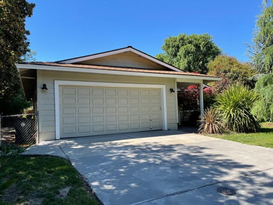 Beautiful SINGLE LEVEL 3+2 home in Phoenix with vaulted wood finished ceiling that welcomes you into the living room. This home has so many great features. The 2 car attached garage has a built out office/bonus room. Still room for 1 car + storage or easily convert it back.  Fenced grassy back yard, oversized Master Suite that also features a vaulted wood ceiling plus direct access to the back patio. The Kitchen is spacious and has a cooktop, oven, refrigerator, microwave and dishwasher. This one is clean, cute and move in ready. New Roof installed in 2020.