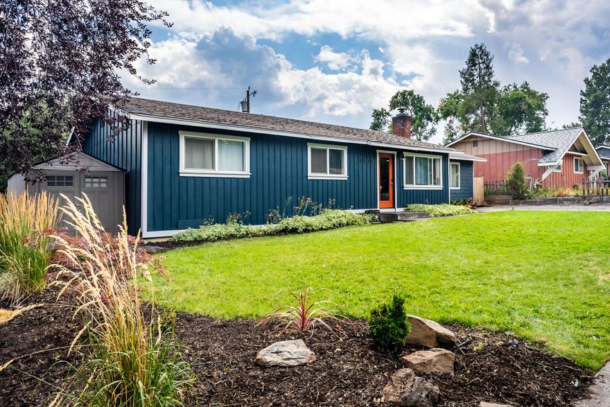 Opportunity knocks. This charming home in the up and coming mid-town Orchard District is a great investment or a beautiful place to call home. This home is an active longer-term AirBnB and has very profitable numbers. Inside the home you will find many beautiful updates and an artist's touch, most done over the past couple years. The kitchen was opened up, new wood floors added, and boasts of stainless steel appliances, soft close cabinets and quartz countertops. The bathroom was updated to a more modern look. All the bedrooms have been repainted and the modern accent walls add modern style. On the outside the front and back yards have been freshly landscaped. The backyard features a two beautiful decks, one attached the home and one situated in the spacious apple tree from the original Orchard. The backyard also has raised garden beds and room for your finishing touches. The garage was converted to a workshop and storage space with the potential to become a future ADU.