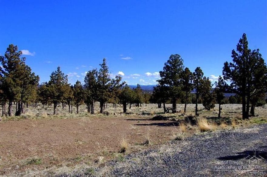 Mountain views - Beautiful buildable parcel on 5 acres. Just off paved road. Power is to the property. Septic has been approved and well is in. Storage building and greenhouse and leveled RV area on property. Close to Prineville Reservoir yet easy commuting to town.