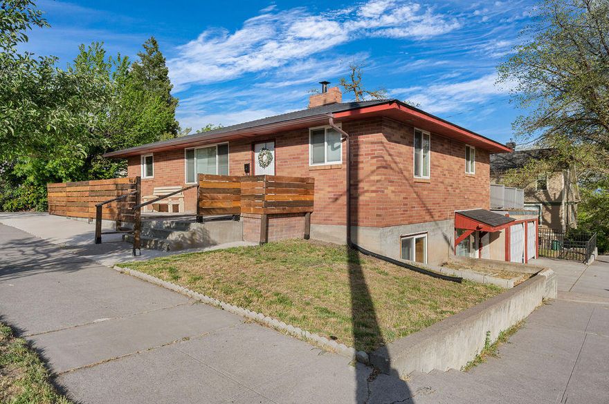 This charming brick home in downtown Klamath Falls offers incredible potential for multi-family living or rental income. With 5 spacious bedrooms and 2 bathrooms, the property is currently configured with separate kitchens and bathrooms on both the upstairs and downstairs levels, each with its own private entrance. The newly renovated kitchen upstairs features modern finishes, and the home boasts durable laminate flooring throughout for easy maintenance. With the addition of a separate power meter, this property can easily be transformed into a duplex or multi-family home. The upstairs also includes an ADA-compliant bathroom for added accessibility. Just steps from downtown, this property is a fantastic investment opportunity or a great home for someone looking for flexible living spaces.