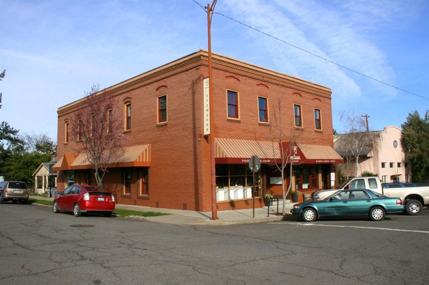 With an extensive 550k remodel in 2008, this very attractive Ashland mixed-use commercial building originally built in 1900 is in its best condition ever both structurally and cosmetically. Finish upgrades included new paint throughout, rubber roofing, heating and air, indoor fire suppression sprinkler system, extensive use of solid Mahogany flooring, beautiful hard wood doors, travertine tile, custom Loween windows and casings, and so much more! Six units 100% occupied.four commercial, two residential. Great tenants. All this and an excellent location in downtown Ashland makes this a solid, feel good investment opportunity. Sale subject to seller 1031 exchange. Listing agent is related to the Seller.