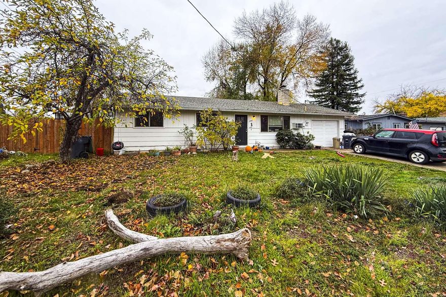 Charming Medford home with great updates throughout! This property features baseboard heating, a fireplace, and a window unit for comfort year-round. Enjoy peace of mind with new windows and doors plus a new garage door already in place. The kitchen and bathroom have been freshly painted, and the shower steps have been redone for a clean, updated feel. With no major repairs needed, this home is move-in ready and just waiting for your personal touch!