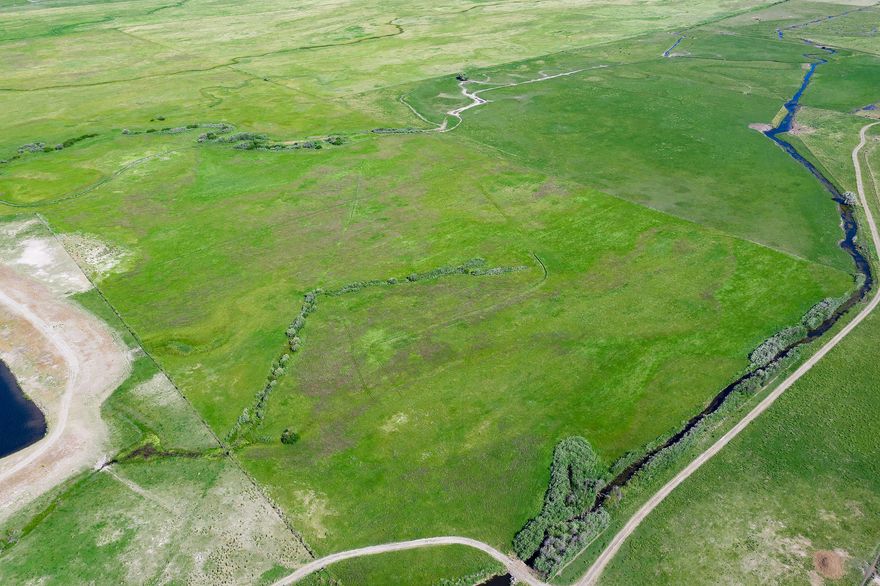 Chandler Hereford Ranch-North Unit.

Currently runs 100+ cows, raises 300+/- tons of meadow hay, and has own set of working corrals