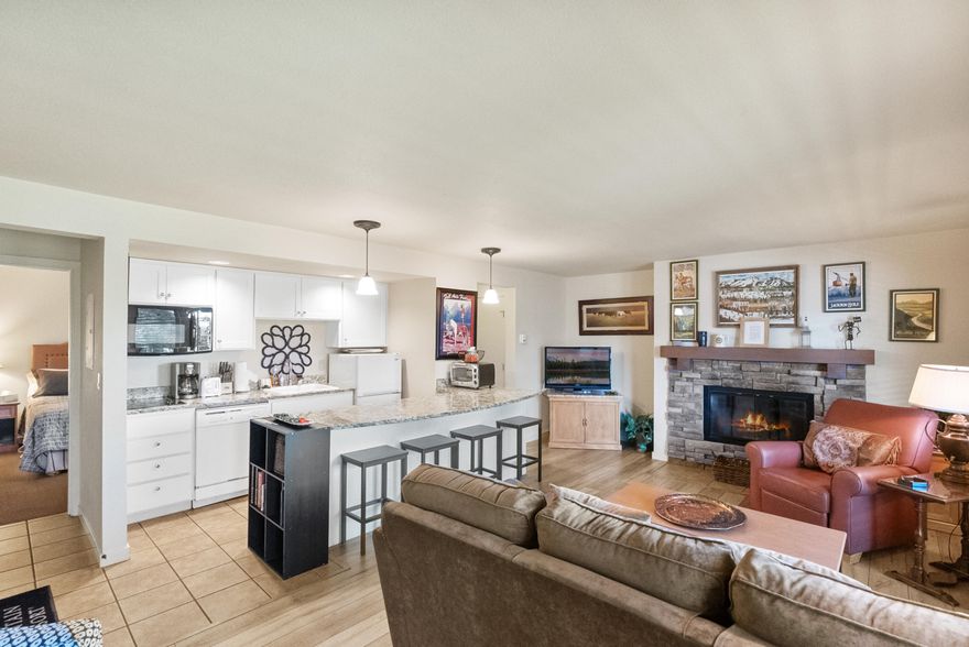 Updated, top-floor Seventh Mountain Resort unit priced to sell. Make this your ''base camp'' for all the Central Oregon activities. One of the closest residential units to the Cascade Lakes & Deschutes National Forest outdoor playground activities. Sold fully furnished down to the silverware & pots/pans, this open floorplan features private views over Seventh Mountain's spacious grass common area. Enjoy all the amenities of the upgraded Seventh Mountain Resort, with 3 pools, bar/restaurant, pickleball & tennis facilities, sauna & fitness center, mini-golf, winter ice skating rink, access to extensive trail systems and much more. This turnkey condo is ready for your private retreat, rental income, or primary residence.