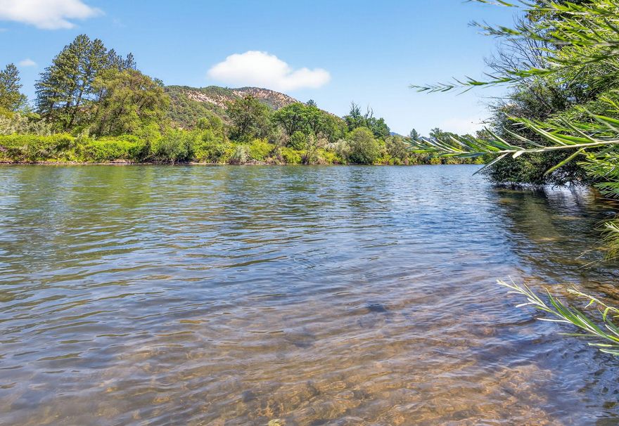 Hard to find beautiful Recreational River Front Property, on the Scenic Rogue River known for its Salmon and Trout fishing.  Enjoy your own gorgeous vacation retreat fenced for privacy, with power and sewer. Seller owns the adjacent property (5508 RRHWY) and is selling it with the option of the new buyer granting a shared well agreement. so, property will have power, septic, and water. Both lots are for sell.