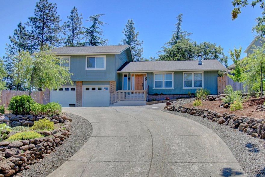 Backed by the Eagle Point Golf Course Community, this jewel of a home is nestled at the end of a culdesac with incredible views. Sitting on the private deck off the master bedroom is nothing short of serene. Tall pines surround the property with a beautifully terraced garden, apple trees, artichokes, and strawberry & asparagus beds. Fully fenced backyard with multiple levels to stretch out and entertain. Covered patio area and wood/garden shed. Beside the home, an extra workspace or parking for that trailer you've needed a spot for. Room for the entire family inside, with three large bedrooms; ample closet space; an additional room on the lower level as a fourth bedroom, guest room or hobby space; and two dining areas on either side of the kitchen. New kitchen counters, bar, fresh paint, & doors. Warm and comfortable environment complemented by the certified wood stove that keeps the heating bill low and the happiness high. One seller is a licensed Broker in the State of Oregon.