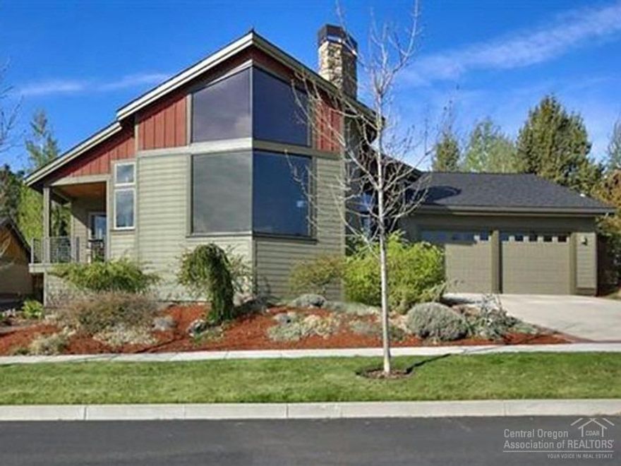 A fabulous Northwest Contemporary Awbrey Park home. Beautiful views from soaring windows taking in tree tops and sweeping vistas of open spaces. Adjacent golf, parks and river trails bring you the Central Oregon lifestyle at its finest. The home boasts a chef's kitchen with GE Monogram appliances and concrete counter tops. A floor to ceiling stone fireplace anchors the great room and the main floor has two master suites, one with a jetted tub. The three car tandem garage will host all your toys!