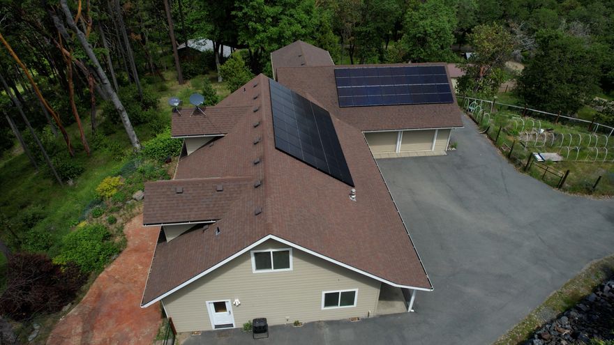 Seeking a peaceful retreat, a base for outdoor adventures, or a multi-generational living setup? On 18+ acres of pristine land, this custom 3046 sq ft home offers many possibilities. Backing to BLM land, you'll have direct access to hiking, hunting, & outdoor adventures (hike to the Rogue River!). Primary suite on ground level. Separate ground-level apartment with its own private entrance provides an ideal space for guests, family, or rental income. For outdoor enthusiasts, the property includes a beautiful garden & orchard with a variety of fruit trees & berries, perfect for homesteading or simply enjoying the beauty of nature. You'll also find a hunting blind on the property, ideal for those looking to take advantage of the land's natural resources. Oversized garage (with 300 sq feet of storage space above), separate garage/shop with 220, and covered RV parking with full hookups.  The property is equipped with enough solar to go off-grid.  **Owner may Carry with acceptable terms**