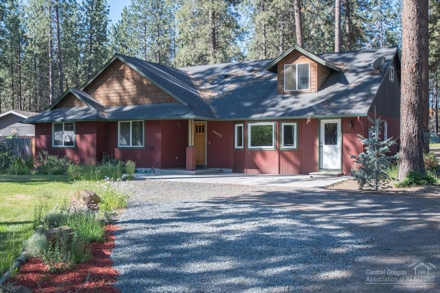 Upgraded family home on nearly an acre in SW Bend on nearly 1 acre! Upgrades include new windows, solar tubes, kitchen counters, paint, carpet & light fixtures - just to name a few. Attic finished into spacious media room & garage converted to bonus room! HUGE shop has 220amp service & 60HP phase converter for running large machines. Shop was used as machine shop for business. Property is fully-fenced for kids, pets & privacy. Paved road all the way to the property. Great for horse or hobby farm!