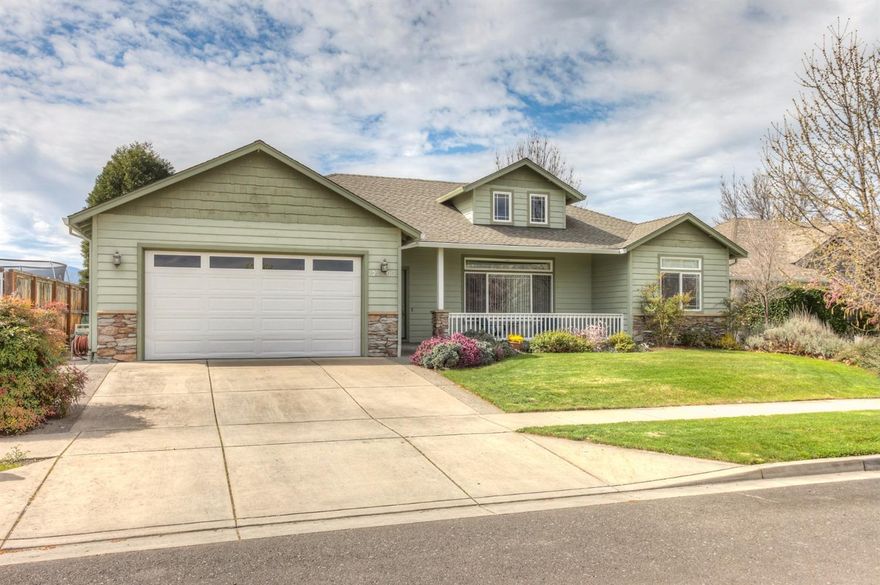 Immaculate with Mountain views and sunsets from back yard, in gorgeous Hampton Place subdivision. Beautiful floors throughout kitchen, living room and hallways, Granite counters, vaulted ceilings with recessed lighting, and Surround sound speakers throughout house. Stunning master suite with jetted tub, separate shower, fenced back yard, pantry in kitchen. Sale includes 2 kitchen barstools. 2 car attached garage is wired for 220, backyard is beautifully landscaped and has sprinkler system.