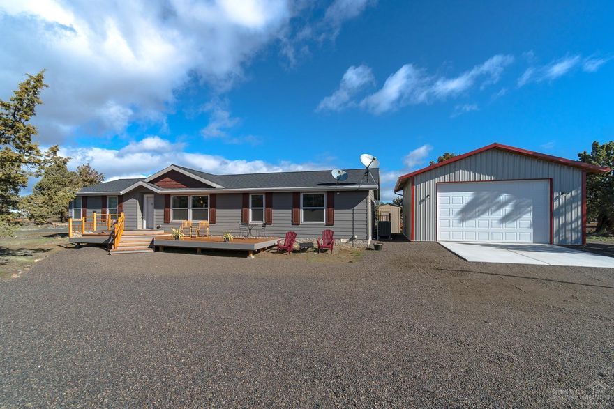 Don't miss this BETTER THAN NEW opportunity! 2016 custom Marlette home on just over 5 acres at the South end of CRR on paved rd. Detached 25x25 shop/garage w/ 12 ft tall door plus 10x20 Hickory shed. Inside you'll find no detail missed! Spacious great room plan w/central island in the Kitchen. Plenty of storage w/pull out drawers, soft close custom cabinetry & 100+ bottle wine cooler. SS gas range, pantry & a coffee bar. Walk in closet in Mstr Ste & a huge bath w/walk in shower & vanity. 2 additional bedrooms, bath & bonus room/den. Mud room complete w/freezer, washer & dryer. Front & rear decks w/pergola & outdoor furniture set included. RV parking with full RV hookups on site. Property outfitted w/7K watt generator setup, propane tank, 1500 gallon septic & much more. Home can be purchased w/most furnishings. Call for details!