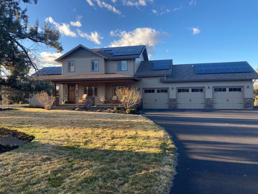 Welcome to this custom home with a lodge-style interior where each detail is thoughtfully crafted. Step inside to discover vaulted ceilings & wood accents throughout. The spacious kitchen boasts ample cabinet space, elegant granite counters, a breakfast bar & stainless appliances - ideal for cooking & entertaining. High-end finishes continue, including Travertine tile & wood floors. There's an office/flex space plus a large bonus room/loft area designed to be a THIRD BEDROOM w/the addition of a wall. Both bedrooms have walk-in closets & the sizeable primary has a spa-like ensuite w/soaking tub & custom shower w/floor-to-ceiling tile. Home is highly efficient w/a 34-panel solar system & heat pump. The oversized 3-car garage is finished w/epoxy floors & has additional storage. Situated on 20 acres in gated West Powell Butte Estates w/access to BLM & breathtaking Cascade Mountain views, enjoy privacy & tranquility while still being conveniently located to Bend & Redmond.