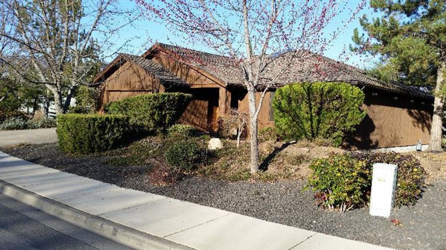 Beautifully built and well-cared for home offers such a feeling of space and privacy! Bordering the open space next to Ashland's golf course, you'll feel you're in your own sanctuary when enjoying the newly refinished covered deck, or just looking out the huge living room windows. Most living, including the master bedroom, is on the main floor; the third bedroom and bath are downstairs with walk-out access to the backyard and onto the open space. A newer roof, tankless hot water, dual fuel range/oven, lots of storage and office space (check out the second bedroom mini-office!), solid wood cabinets, easy care landscaping - all combine to make this a comfortable, inviting home that has a unique feel. HOA dues are $175/quarter for maintenance and upkeep of the really lovely and peaceful open space with surrounding trails. An Ashland Fire-Safe Neighborhood.