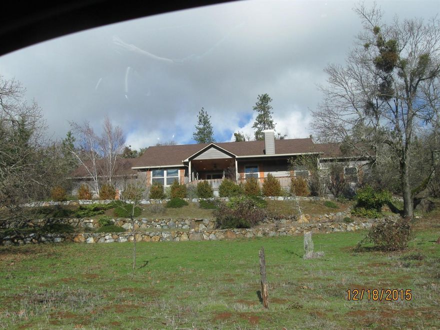 Paradise Found! This newer home in a beautiful setting just outside city limits with view boasts 3 bedrooms, 2.5 baths with a loft and a separate guest quarters with 2 bedrooms and 1 full bath, kitchen and living area. Main home and guest home have both been freshly painted, new fixtures, new sinks/fixtures, new appliances include a cook top and dishwasher in main home and new range oven in guest home. New heat pump too! Move in ready condition just awaiting new owner. Seller offers home warranty credit up to $500 for owner occupied buyer.