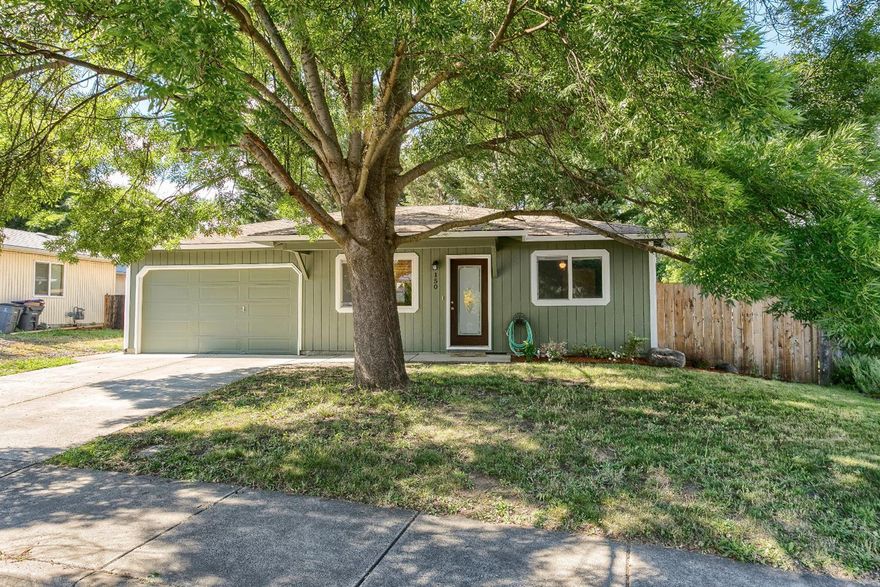 This sweet, single-level home has been lovingly cared for and updated through the years, including a BRAND NEW exterior paint job! With 3 bedroom and 1 bath, it features a roomy kitchen open to the living area and backyard patio, perfectly suited for entertaining! The floor plan is highly functional and efficient with double paned vinyl windows, and features recent updates throughout such as new light fixtures, ceiling fan, bathroom sink and faucet etc. This is a great home, situated on a quiet street and in an ideal location! Close to schools, shops, the Friday Farmers' Market and Talent's awesome restaurants. Access Ashland in about 5 minutes. Outdoor features include fenced backyard, a large shed with power, raised garden beds and mature trees offering wonderful shade.