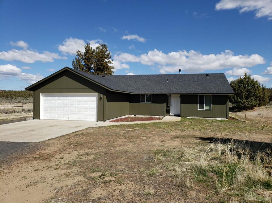 Nice open floor plan with this 3 bedroom, 2 bath home south of Prineville towards Prineville Reservoir. Spacious level 1.8 acre parcel, fenced, good soil, plenty of room for shop/barn and animals, close to BLM. Large utility room with attached garage. Call for more information, maps and details on this property.