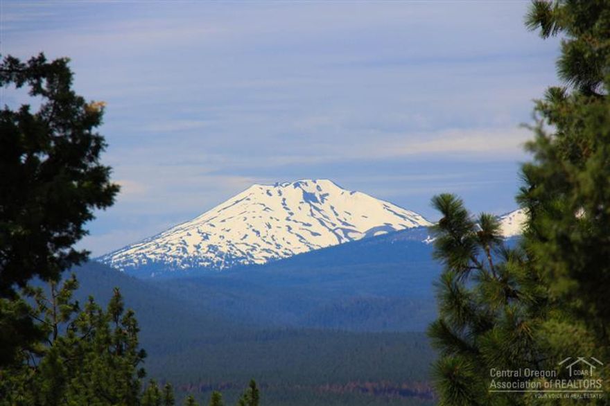 Stunning Cascade Mountain and forest views from nearly an acre on Awbrey Butte. Enjoy the parks and tennis courts or access the beautiful 19 mile Deschutes River Trail. This downhill lot is convenient to schools, shopping and all of the recreation Central Oregon has to offer. Bring your builder to customize your dream home on this special property.