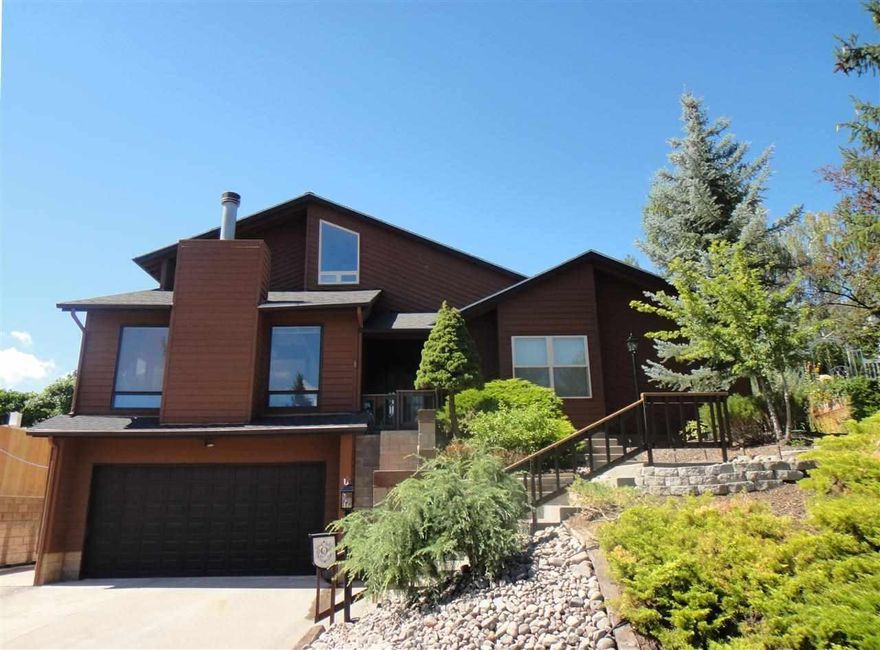 Spacious Custom Home Offers An Open Floor Plan With High Ceilings And Ample Windows In The Living And Dining Areas To Enjoy The Views. Lots Of Updates Throughout With Tile Floors, New Carpet And Paint. Gourmet Kitchen Features Jenn-air Cooktop With Inserts, Bosch Dishwasher, Solid-surface Countertops And Large Garden Window Overlooking The Backyard. Upper Level Master Suite Features A Loft Sitting Area And Large Updated Bath With Travertine Tiled Shower. Conveniently Located Near Hospital & Oit.Other Features Include Gas Fireplace In Living Room, Wood Stove In Family Room, Central Heat And Ac, Central Vacuum System, Intercom, Bonus Room On Lower Level Off Garage, Terraced Backyard With Mature Cherry, Plum & Apple Trees, Deck, New Shed And Children S Play Structure.