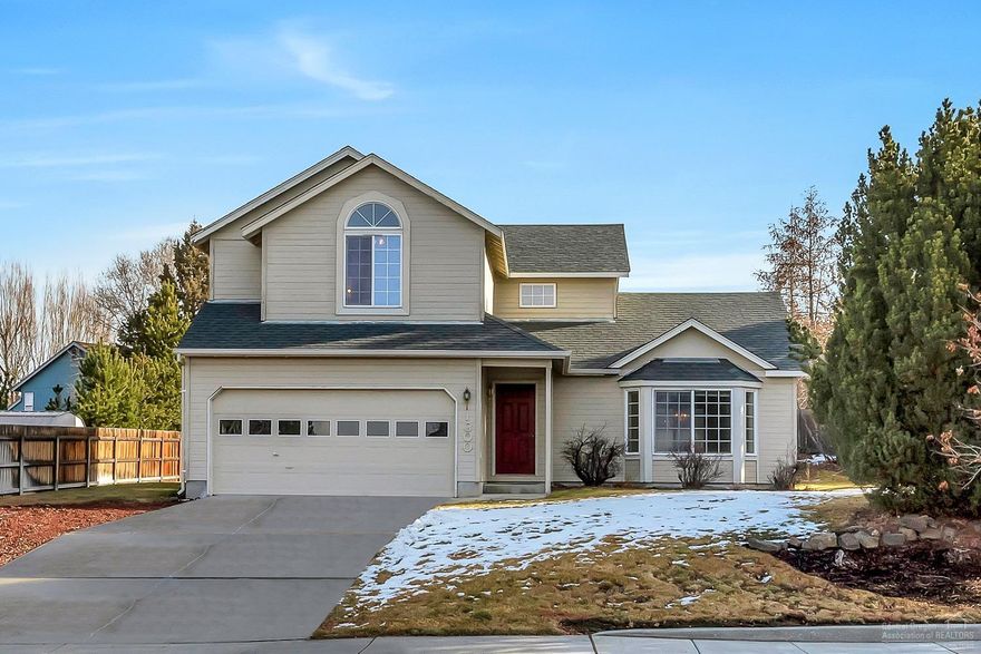 This Providence home sits perched above the street with spectacular mountain views of Broken Top, Three Sisters and Pilot Butte. Boasting multiple, main level living spaces, vaulted ceilings, gas fireplace and three spacious bedrooms upstairs, the home breathes with plenty of space for everyone. Enjoy a generously sized, private backyard to entertain in and wake up each morning to grand views rarely seen at this price point. Positioned just blocks to the community park and within a stone's throw of Worthy Brewery, you're simply minutes from enjoying all the amenities the east side has to offer. Opportunity surely awaits to make your personal mark on this lovely home in the well established community of Providence.