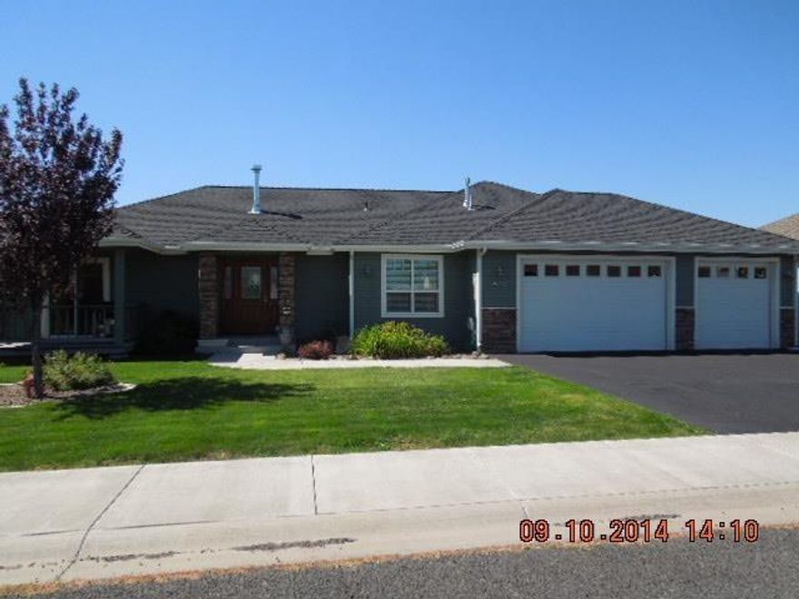 Very Cute Newer Family Home In Quiet Neighborhood!. 3 Br, 2 Bath, 1967 Sf W/ Study/Den.Open Living Room With Great Vaulted Ceilings & Fire Place. Spacious Kitchen With Formal & Informal Dining.Split Floor Plan And Master Bedroom With Large Walk-in Closet, Soaking Tub & Separate Shower. All This Plus Central Vacuum And An Alarm System.Fully Fenced & Landscaped Back Yard With In Ground Sprinklers & Additional Out Building & Rv Parking Plus A Large 3 Car Garage. Covered Front Deck With Sliding Glass Entry Through Informal Dining Area. Perfect For Bbqing! Sellers Are Motivated And The House Is Move In Ready.