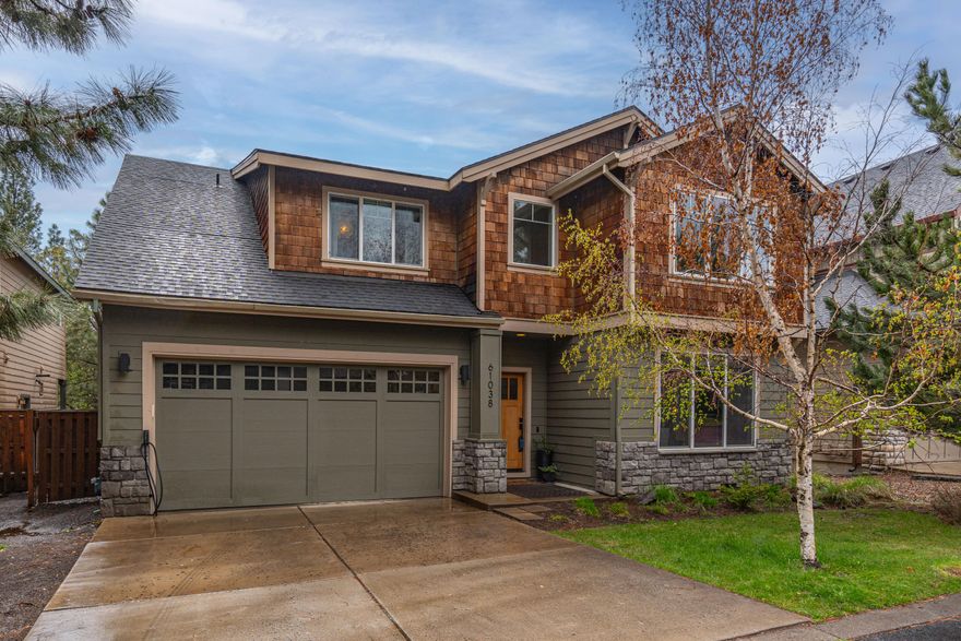 Beautiful designers home in River Canyon Estates. This home lives large with multiple living areas. The welcoming foyer opens to a living/dining area that leads to the great room with vaulted ceilings and a wall of windows that lets in abundant sunshine. Kitchen offers ample storage, a pantry, butcher block island, stainless appliances & an adjacent dining area. All bedrooms are upstairs. Primary suite has a coffered ceiling, large bath & closet. Two additional rooms & laundry upstairs. Back yard is fully fenced with mature landscaping and paver stone patio. The 3-car tandem garage with 8 foot door. 3rd bay has been converted to create a home office/hobby room but could easily be changed back. Recently painted with new flooring and custom built-in shelving. This special SW Bend community has a pool, clubhouse, fitness center & tennis/pickleball courts. All of this plus it is conveniently located on a quiet street near River Canyon Park with easy access to the Deschutes River Trail.