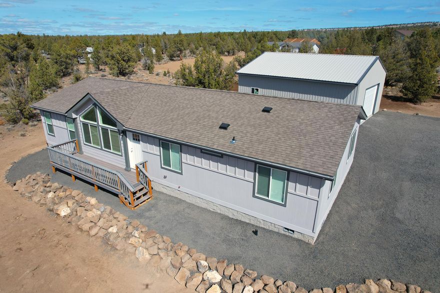 Brand New Home And Shop On 1.81 Acres!! This 3 bedroom 2 bathroom 1620 sqft home will not disappoint! Vaulted ceilings throughout the home and a lot of windows make this home bright and airy! A large kitchen with a ton of storage, and a large breakfast bar and pantry! The master bedroom features a walk-in closet and bathroom with a soaking tub shower combo! Outside is clean and fresh with a gravel driveway and Brand New Decks in front and back! Don't forget about the shop, it is 30'x36' with a slab, power, a 16' wide door, and 12' eves. Bring your projects and toys, plenty of room for all! Subdivision has access to thousands of acres of public land. Call today for a showing