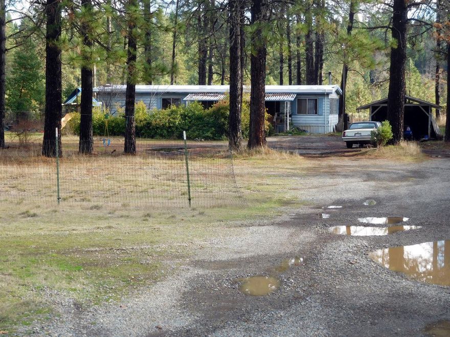 Older Mfg. home, currently rented. Owner has never occupied this home. May need some tlc. Property is really nice, level scattered variety of trees. Must have 24 hour notice for appt to show.