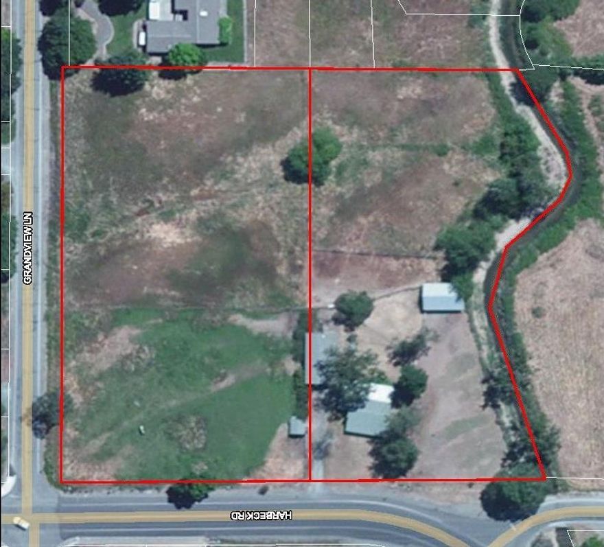 Development Potential! Rare multifamily or single family subdivision development land. Zoned R-3 with a total of 3.93 acres and two tax lots. Excellent location within city schools and great proximity to the hospital, shopping, banking, and downtown Grants Pass. Buyer to do own due diligence with the city.